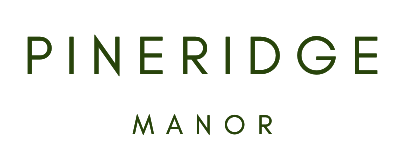 a man wearing a green shirt with the words prince of manor on it